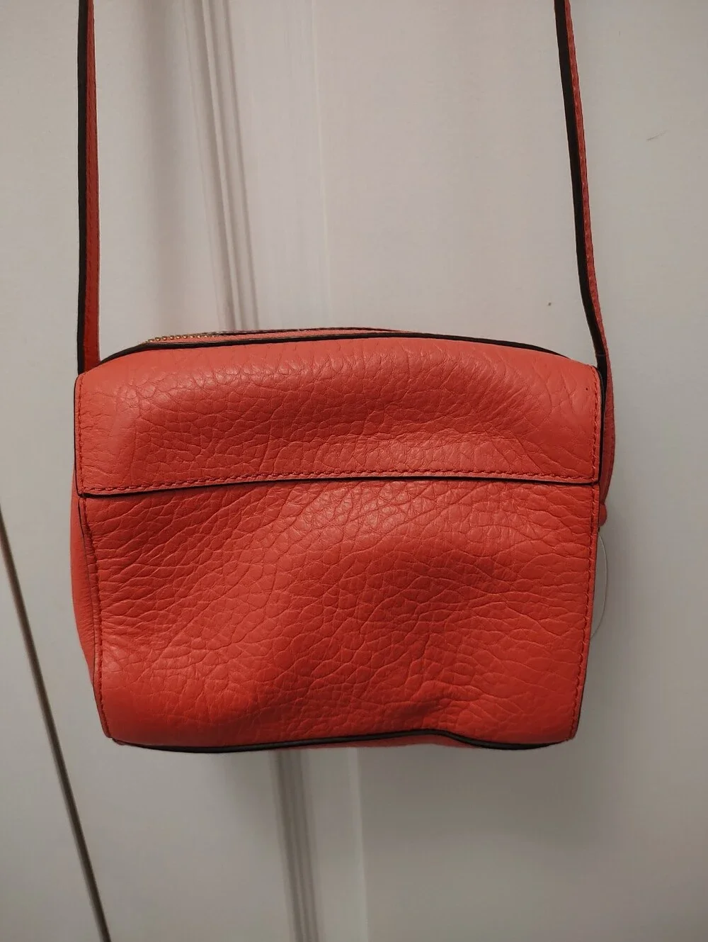 Kate Spade Coral Pink Leather Crossbody Bag with Floral Cutout